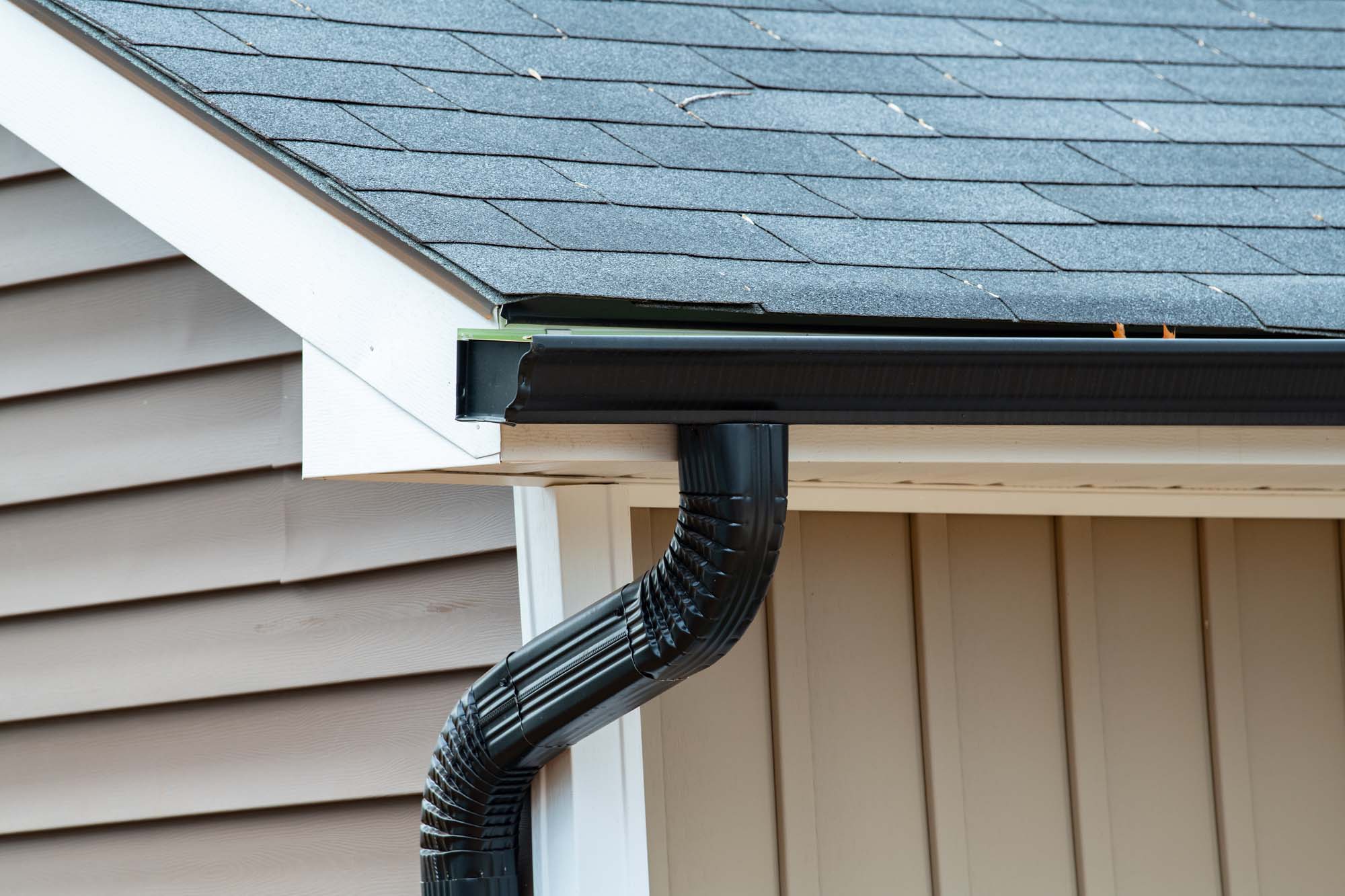 rain gutter of roof with downpipe